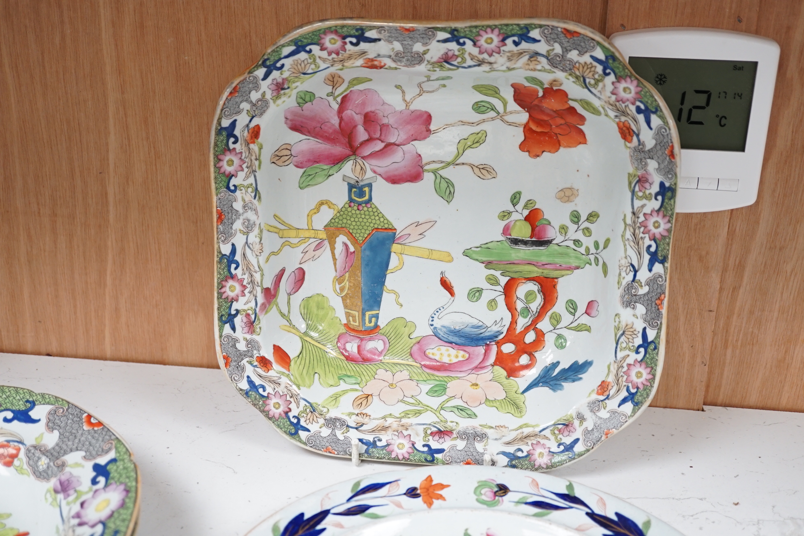 Four early 19th century ironstone dishes and a tureen together with a similar plate
